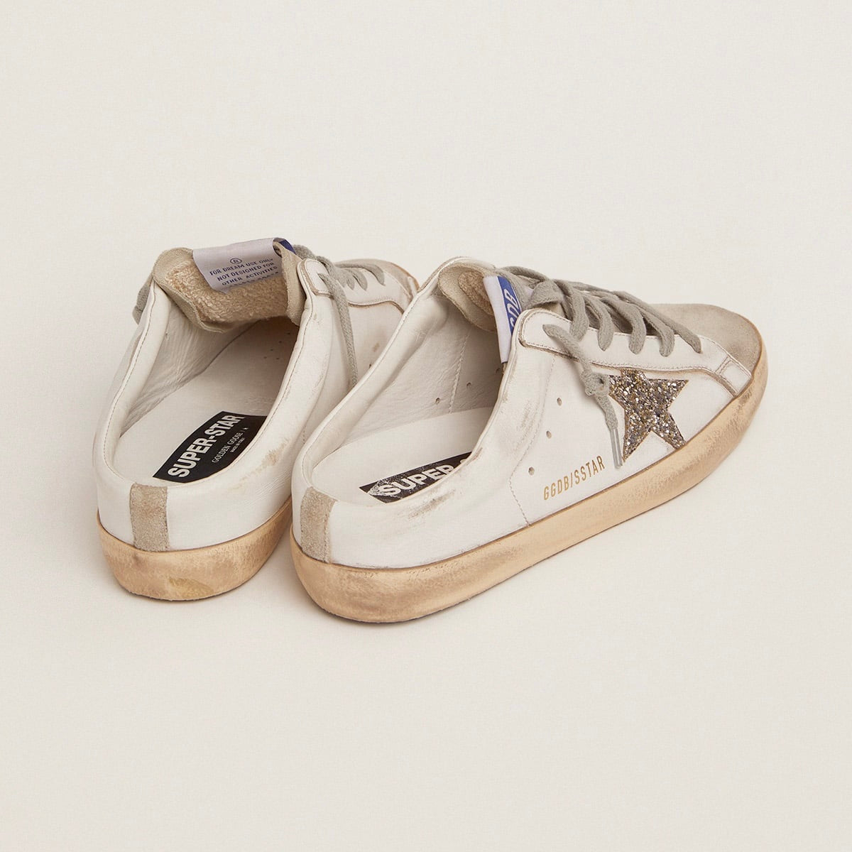Golden Goose Super-Star Sabot with a platinum glitter star and suede tongue(Women's)